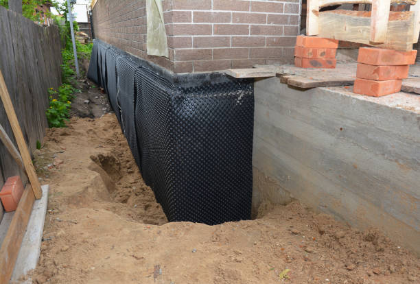 SJ Waterproofing Pros technician performing targeted Waterproofing assessment in Jefferson, MD